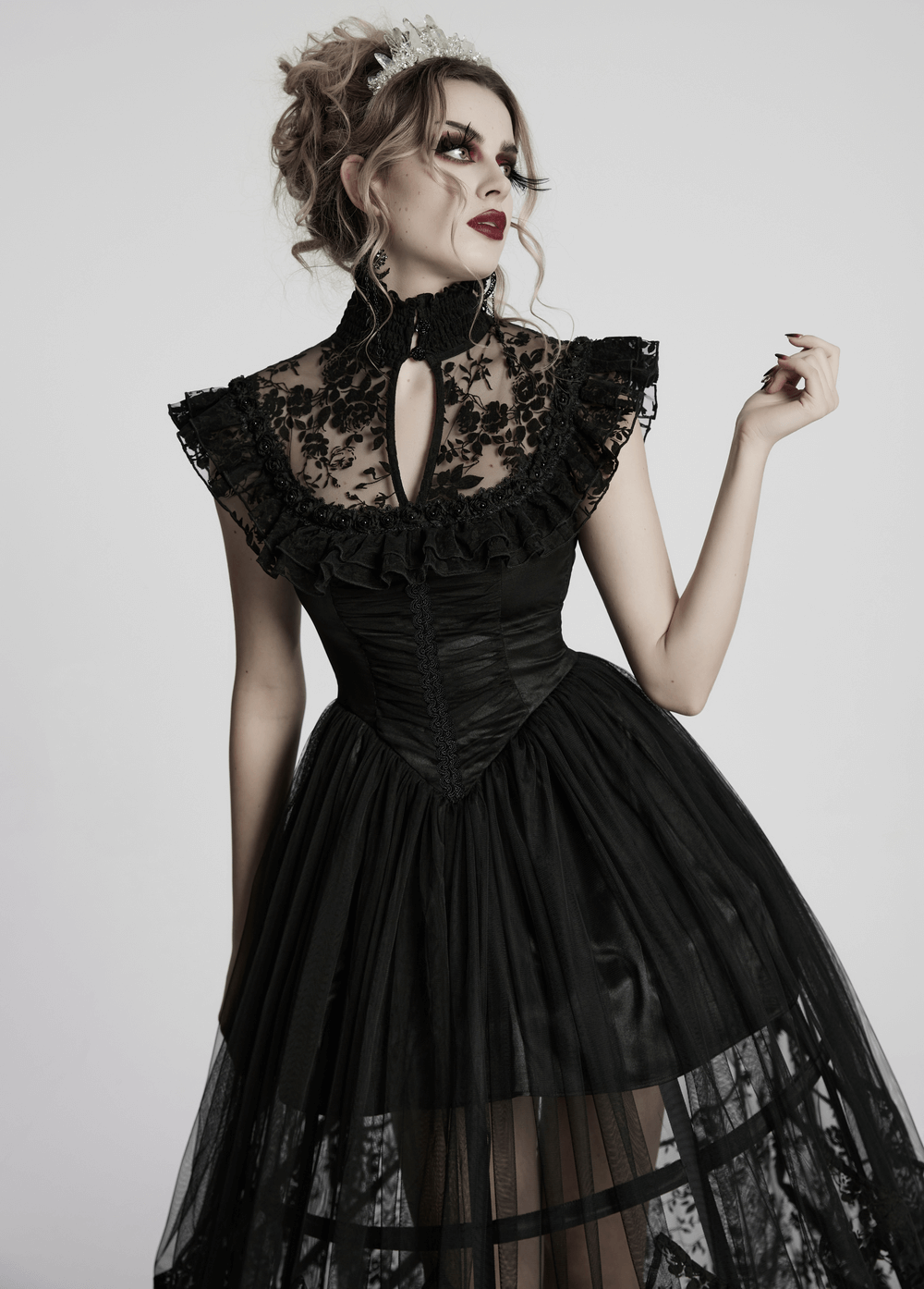 Elegant black lace gothic dress with ruffle sleeves and high neck, perfect for Victorian-themed events.