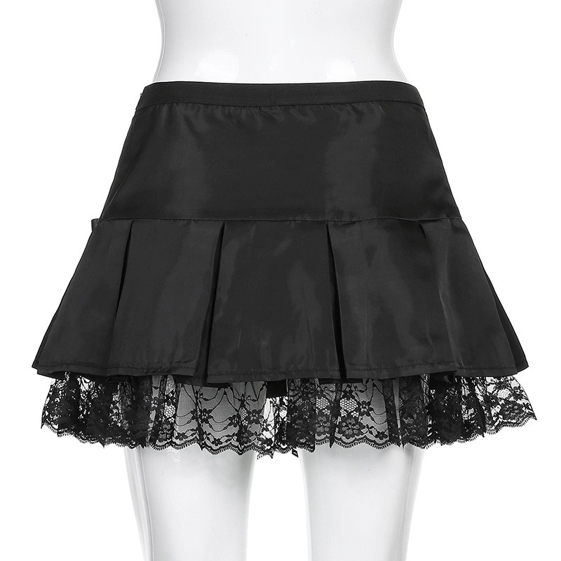 Black lace gothic mini skirt featuring pleated design and bows, perfect for stylish outfits.