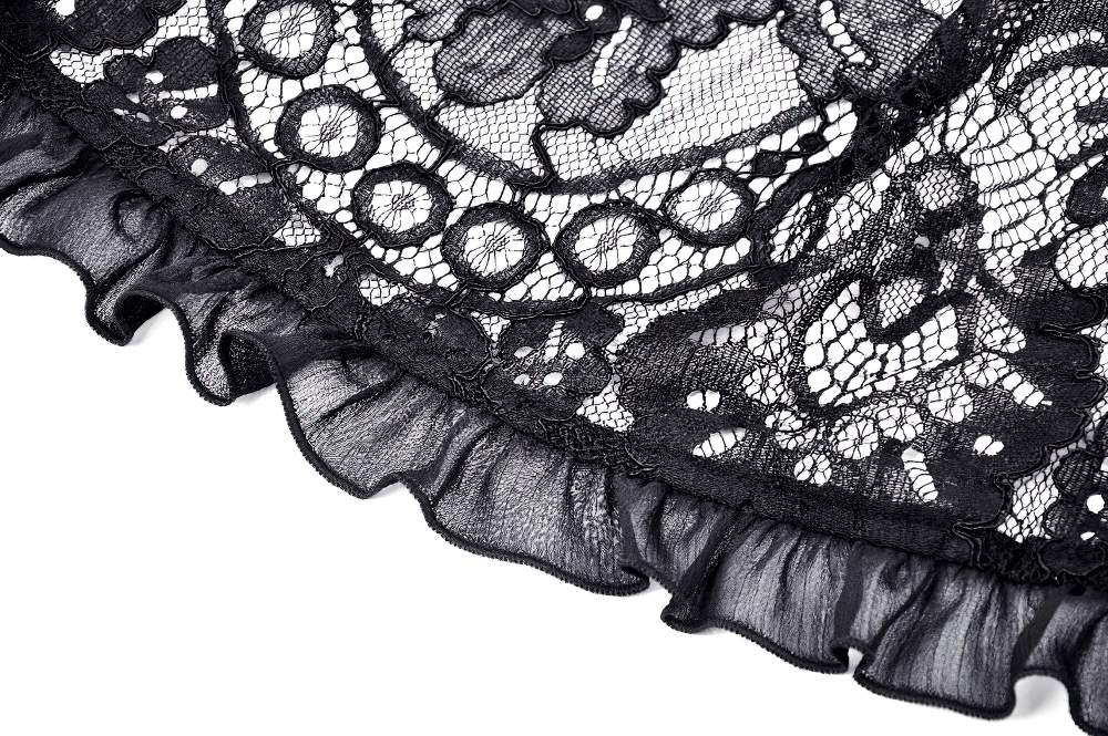 Close-up of black lace detailing with floral patterns and ruffled edges, perfect for a gothic off-shoulder cape.