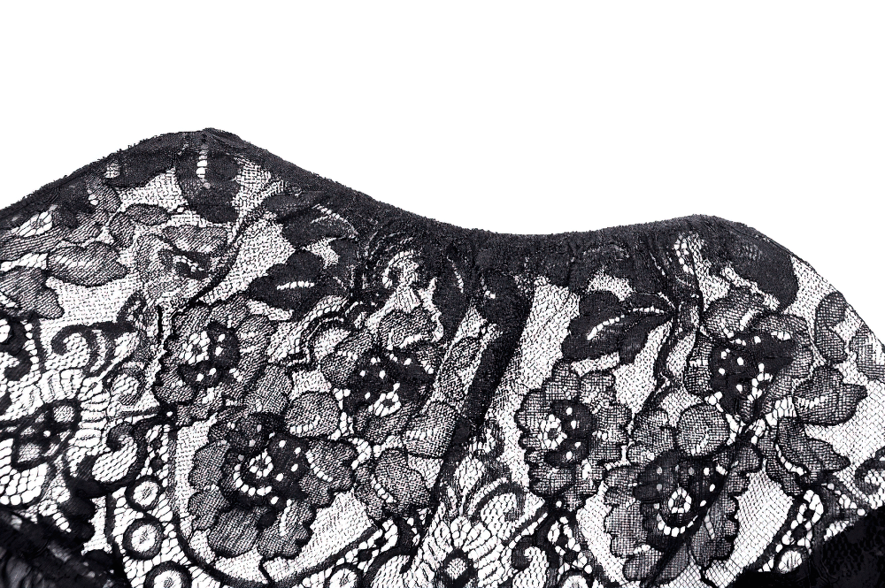 Close-up of intricate floral black lace, showcasing the delicate design of a gothic off-shoulder cape.