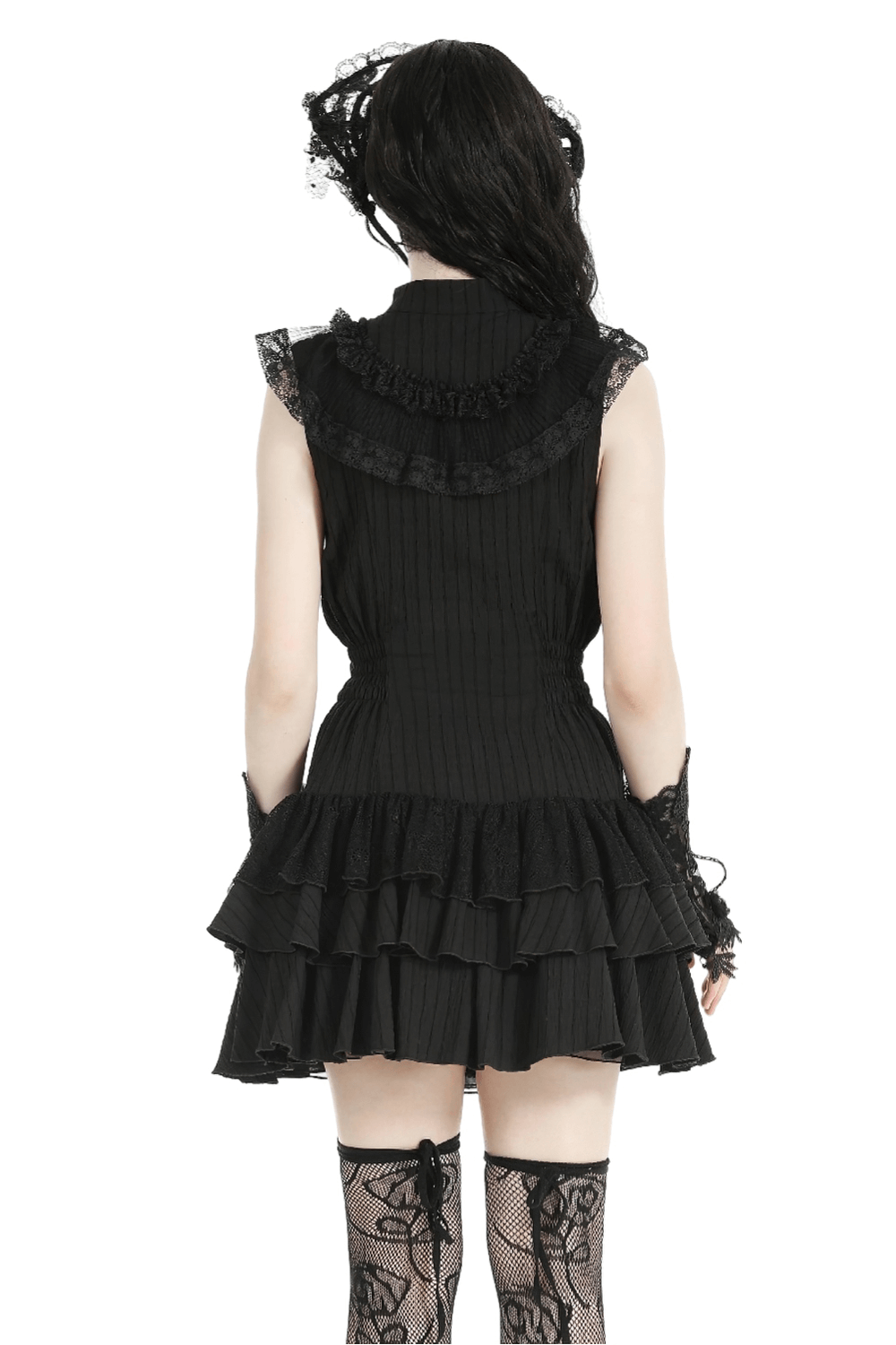 Back view of a black lace gothic ruffled dress, featuring elegant ribbon detail and flared skirt.