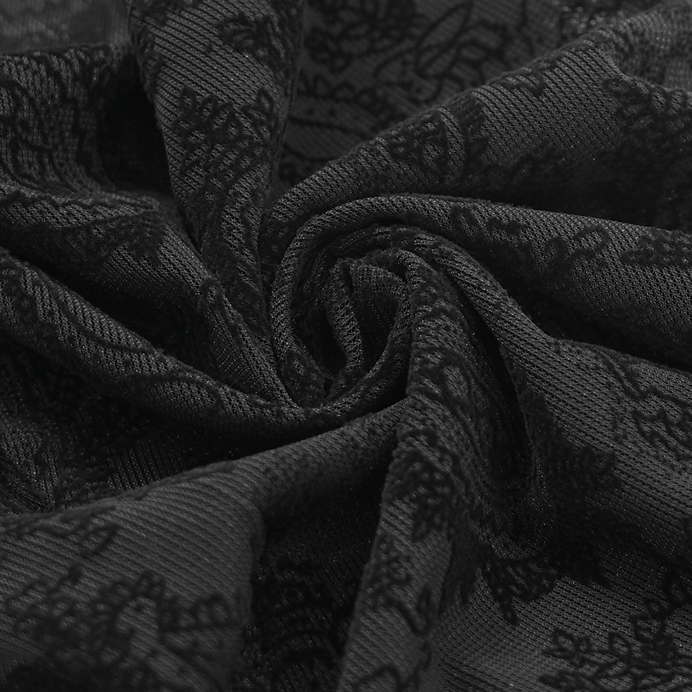 Close-up of black lace fabric featuring intricate floral patterns, perfect for gothic and Victorian-inspired styles.