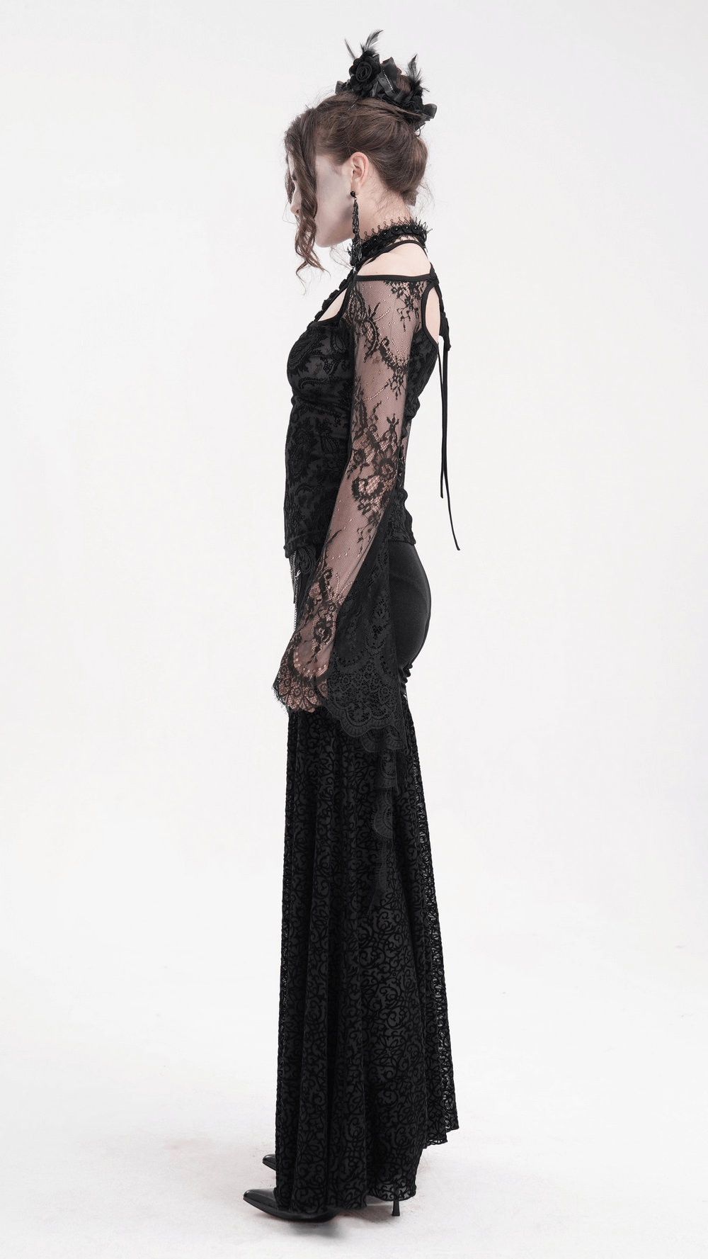 Elegant black lace gothic top with bell sleeves and neck chains, showcased in a stylish side profile.