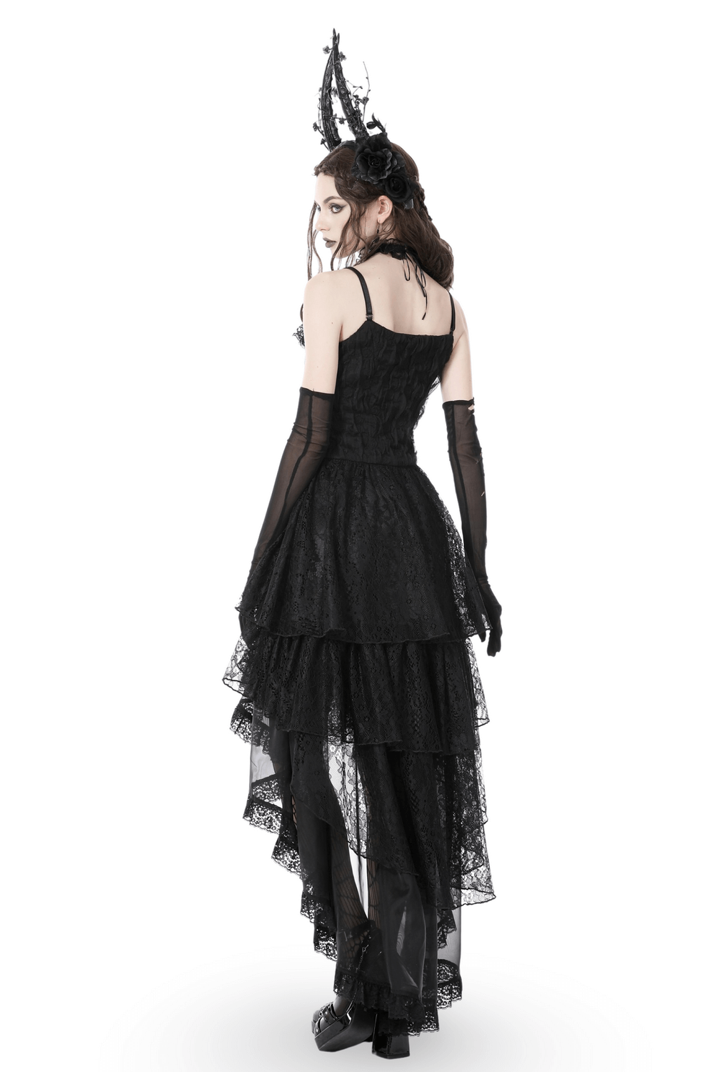 Black lace high-low dress with romantic gothic frills, showcasing a flowing skirt and elegant detail from the back.