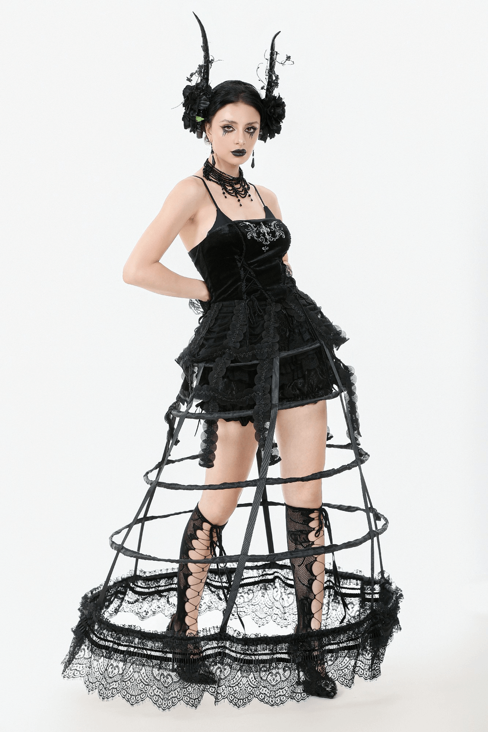 Gothic black lace hoop petticoat with edgy vintage details for a dramatic high-low style.