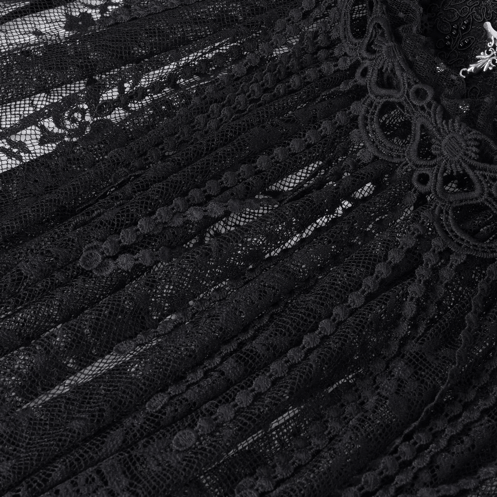 Intricate black lace fabric showcasing detailed patterns for gothic fashion enthusiasts.