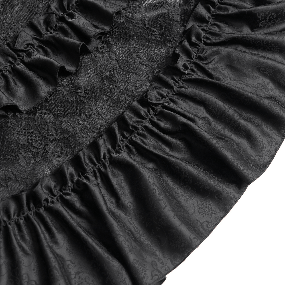 Close-up of black lace with ruffled satin trim, perfect for gothic or medieval-inspired fashion.