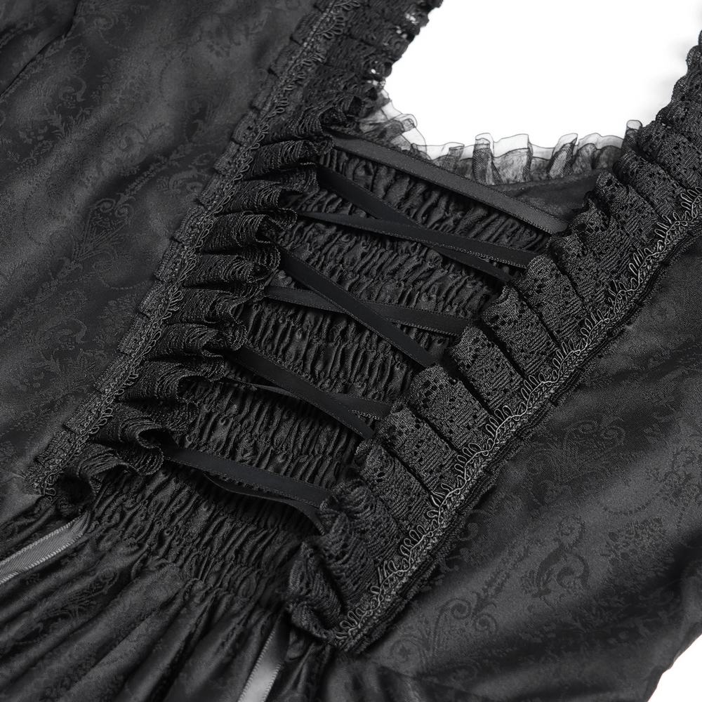 Close-up of black lace corset back detailing with ruffles, showcasing Victorian elegance and gothic style.