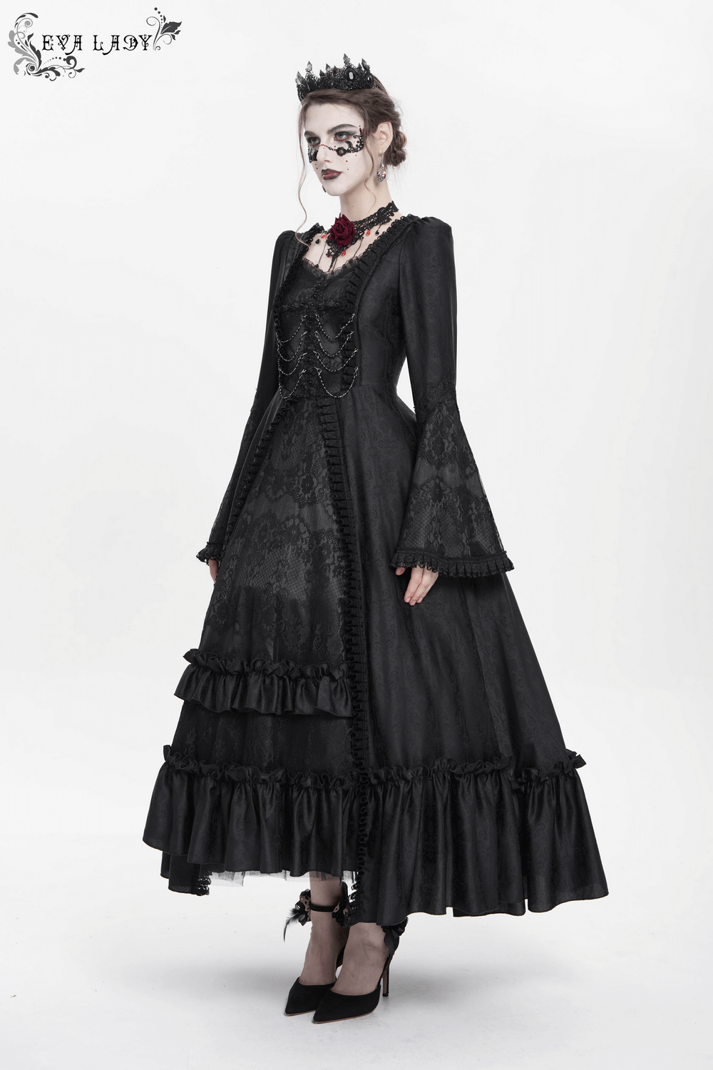 Gothic black lace medieval dress with long bell sleeves and corset back, featuring decorative chains and ruffled skirt.