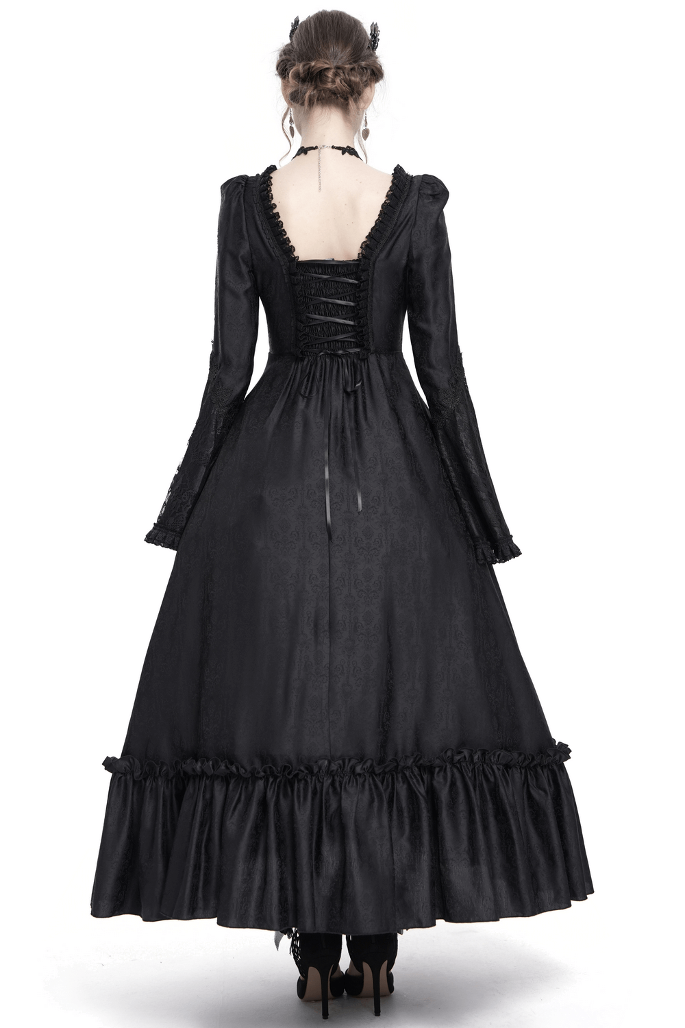 Back view of a black lace medieval style dress with bell sleeves and corset details, perfect for gothic events.
