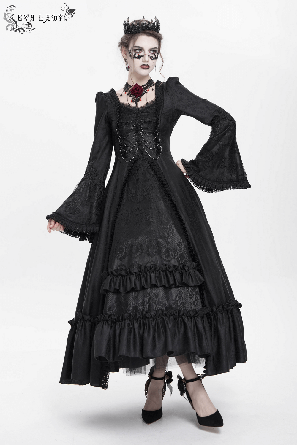 Victorian-inspired black lace medieval dress with long bell sleeves, corset back, and layered ruffle skirt.