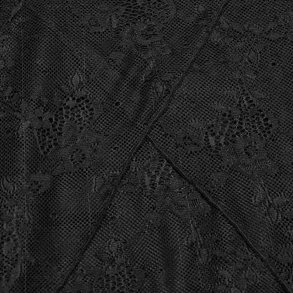 Close-up of delicate black lace fabric with intricate floral patterns and soft mesh texture.