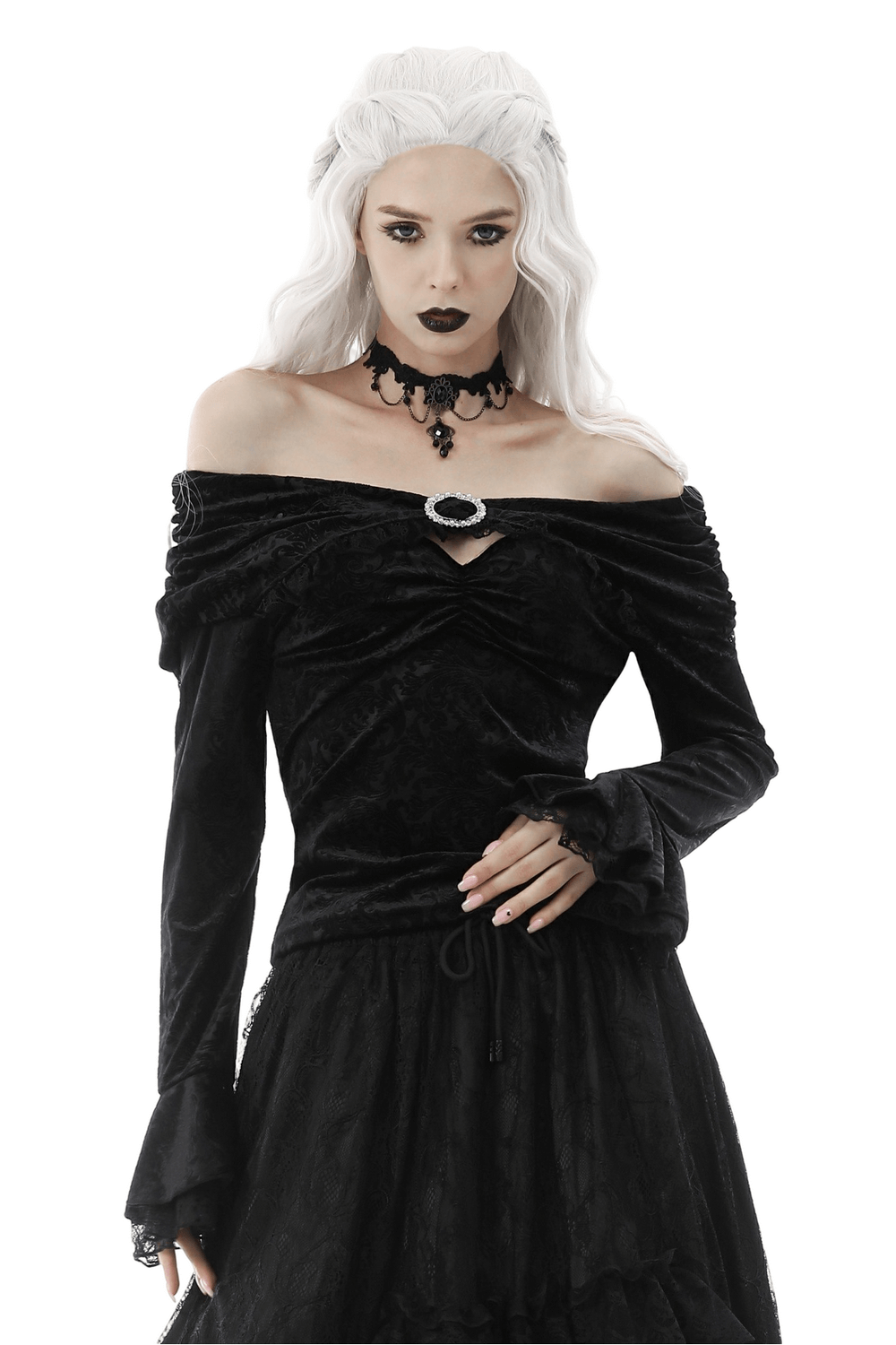 Elegant black lace off-shoulder top with brooch detail, styled with gothic accessories for a stunning Victorian look.