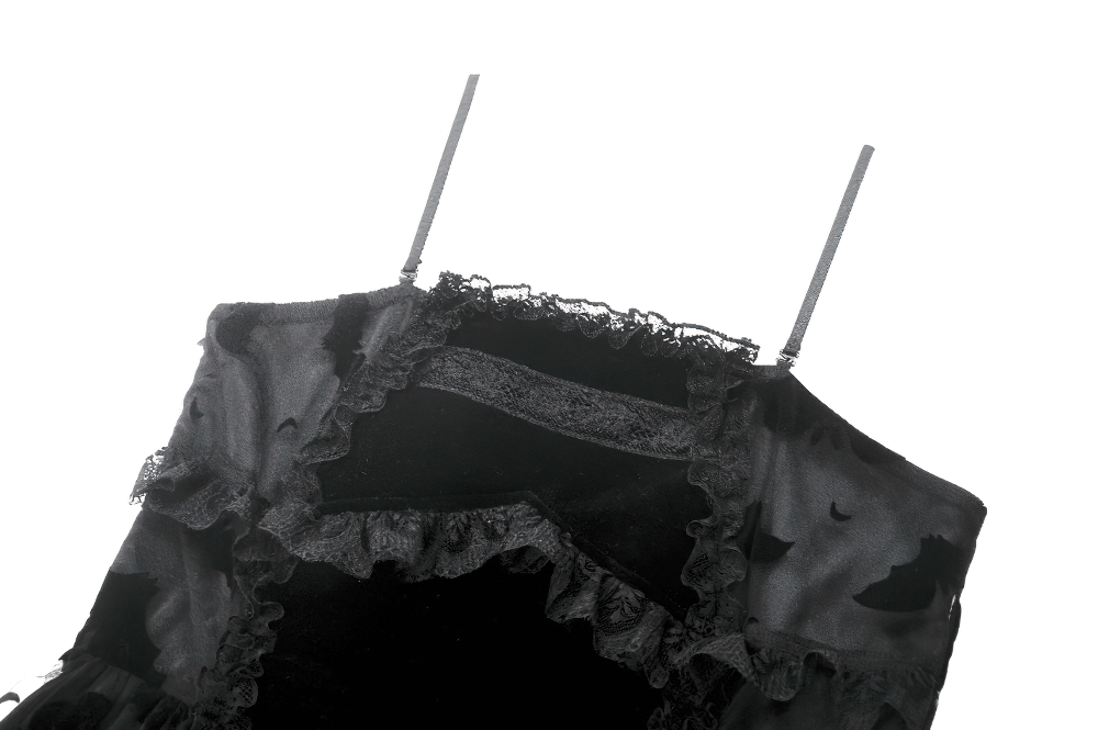 Close-up of a black Gothic dress with ruffled lace detailing and adjustable straps, showcasing a dark and elegant design.