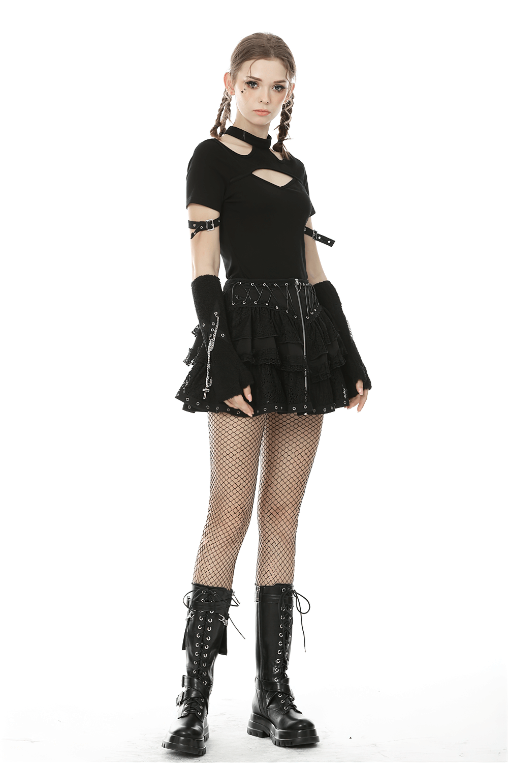 Gothic black lace ruffled skirt with heart-shaped lacing, paired with edgy accessories and lace-up boots.