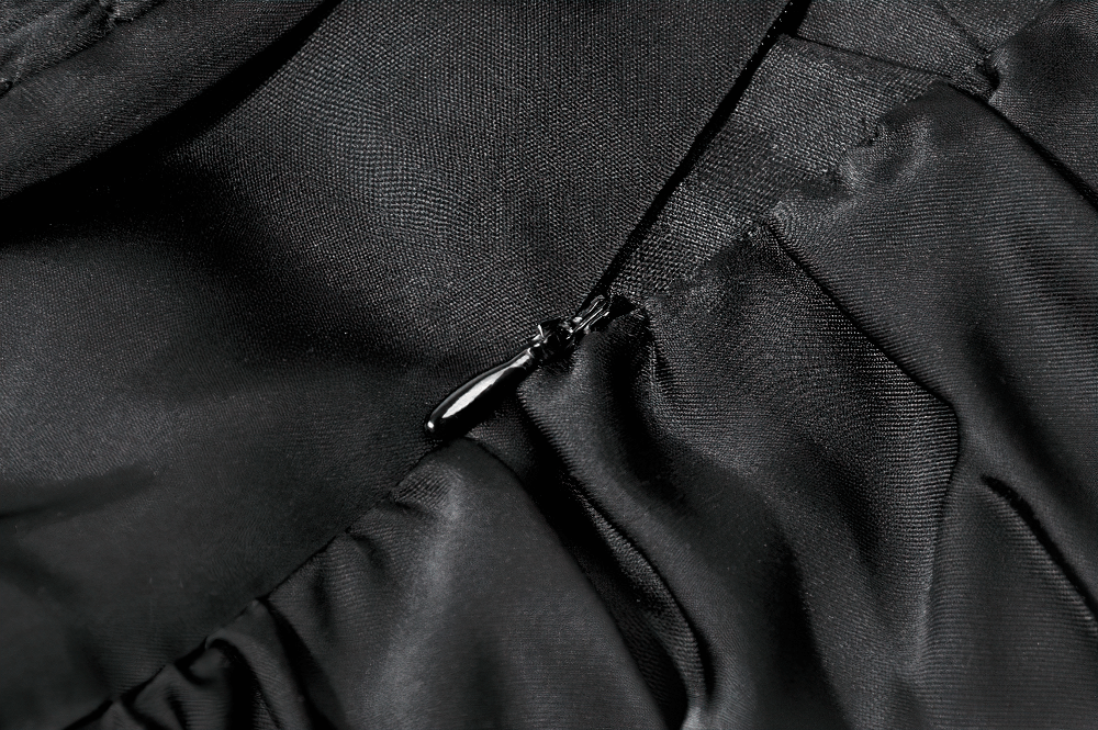 Close-up of the zipper detail on the Black Lace Ruffled Tiered Gothic Dress with Spaghetti Straps.