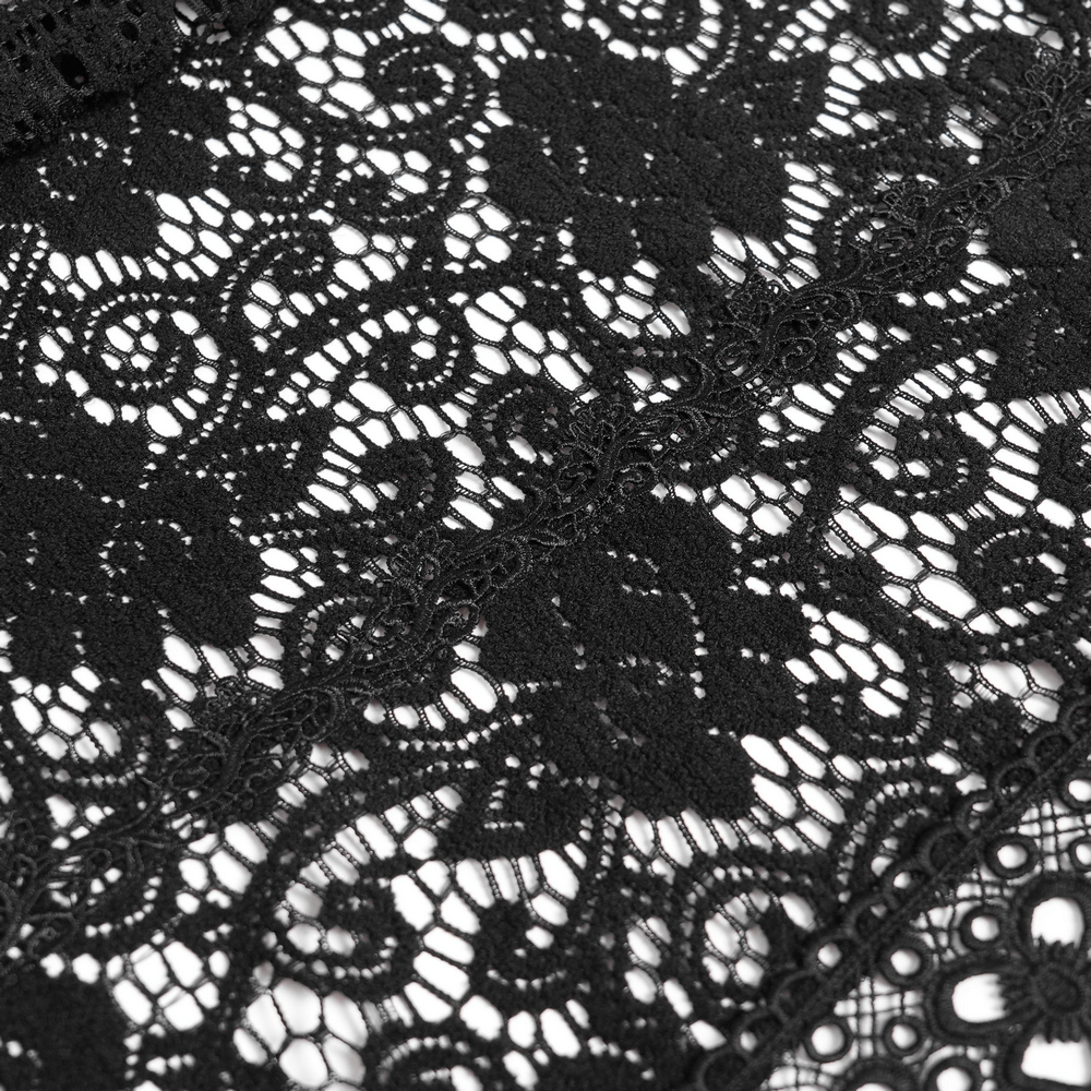 Black Lace Shawl with Fringed Hem for Gothic and Boho Style close-up showing intricate lace design.