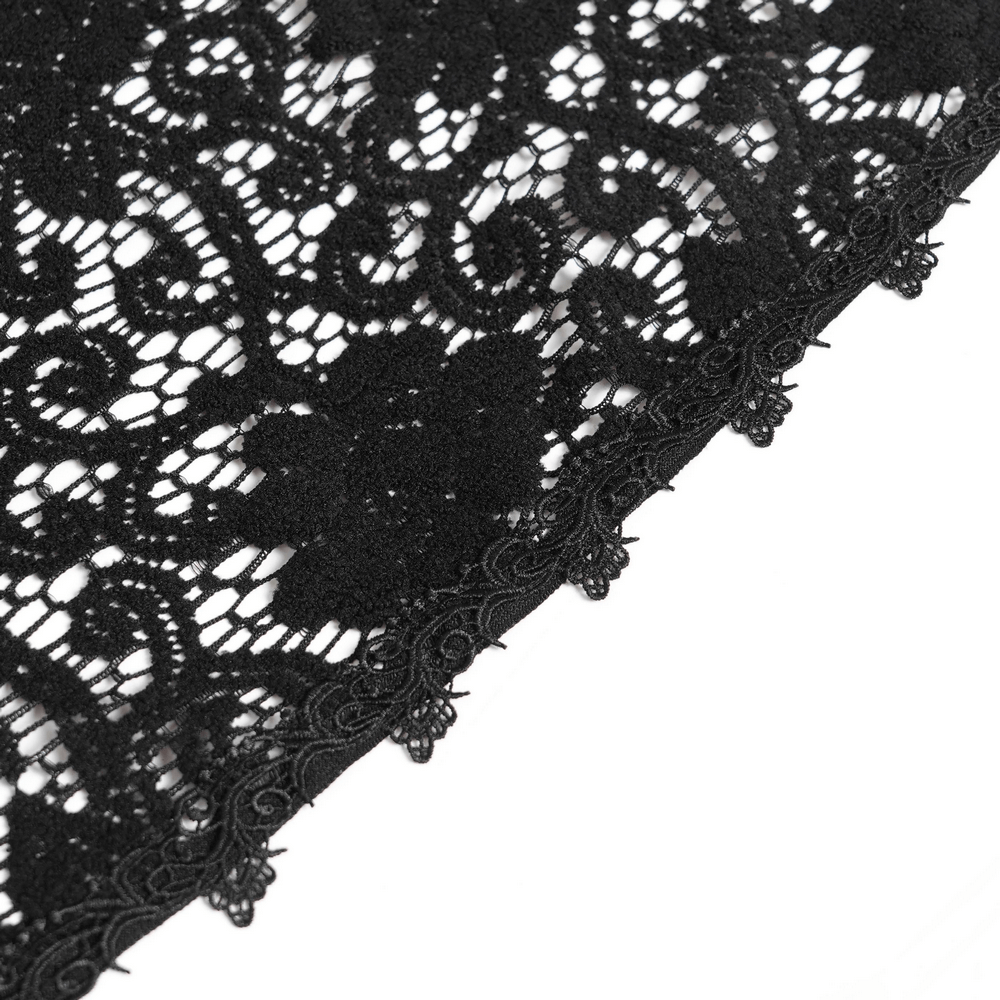 Black Lace Shawl with Fringed Hem for Gothic and Boho Style - close-up of intricate lace detail and fringed hem.