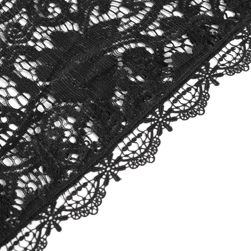 Close-up of the intricate design of the Black Lace Shawl with Fringed Hem for Gothic and Boho Style.