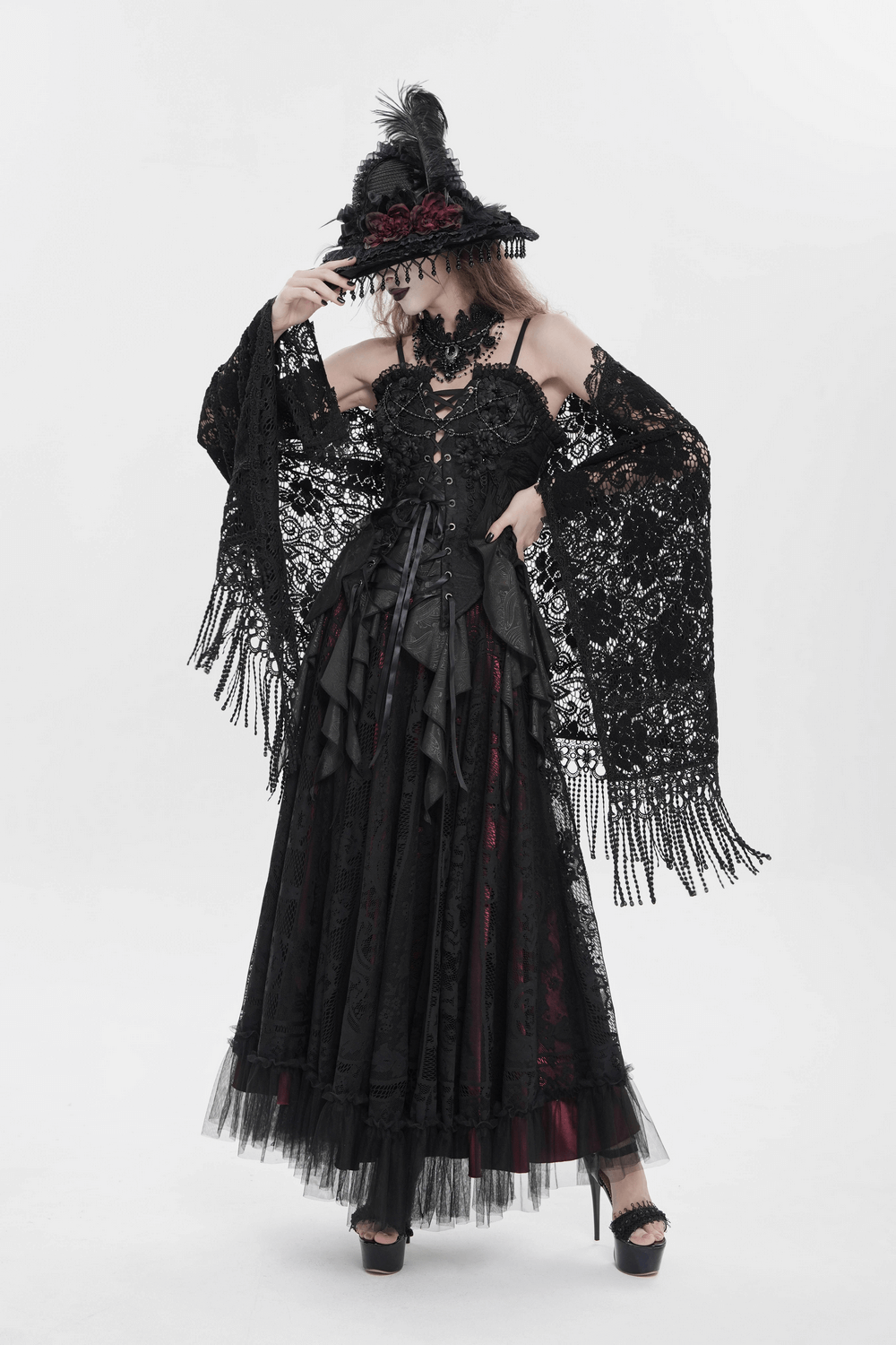 Black Lace Shawl with Fringed Hem for Gothic and Boho Style, showcasing intricate lace design and dramatic flair.