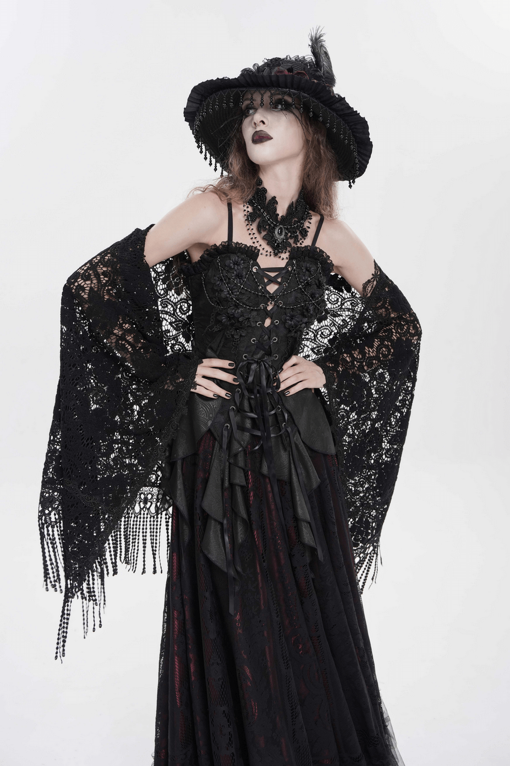 Black Lace Shawl with Fringed Hem for Gothic and Boho Style worn with dramatic outfit and accessories.