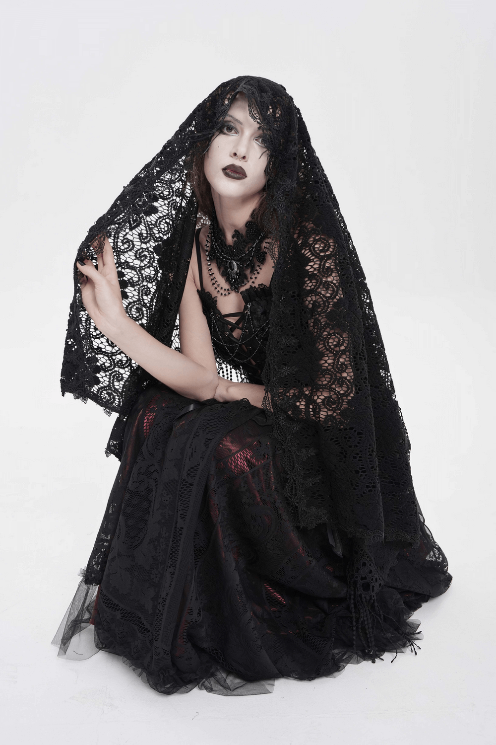 Black Lace Shawl with Fringed Hem for Gothic and Boho Style, showcasing a model in a dramatic gothic outfit.