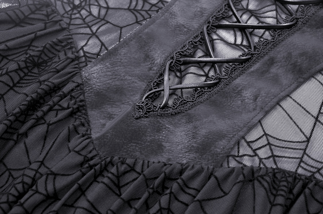 Close-up of black lace dress featuring spiderweb pattern and intricate lacing for a gothic punk style.