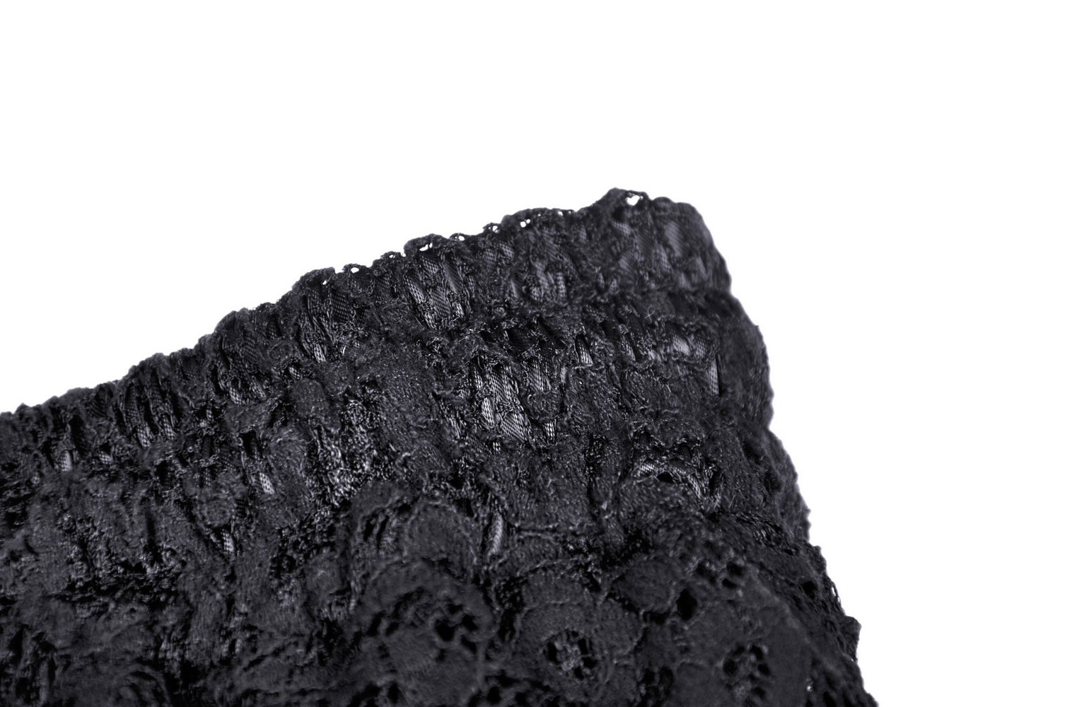 Close-up of the waistband of a black lace tiered skirt with frills and drawstring features, showcasing intricate details.