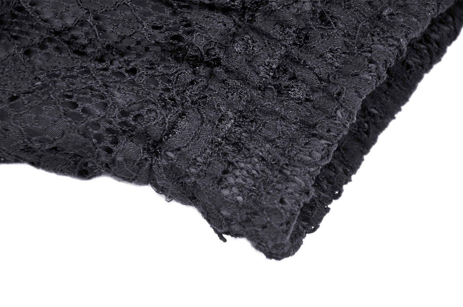 Close-up of black lace fabric on a tiered skirt with frills, showcasing drawstring edge design.