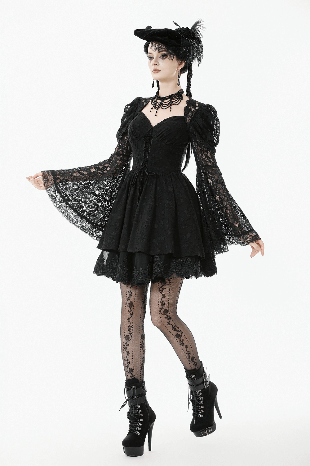 Black Lace-Up Gothic Mini Dress with Bell Sleeves on a model showcasing gothic style and intricate lace details.