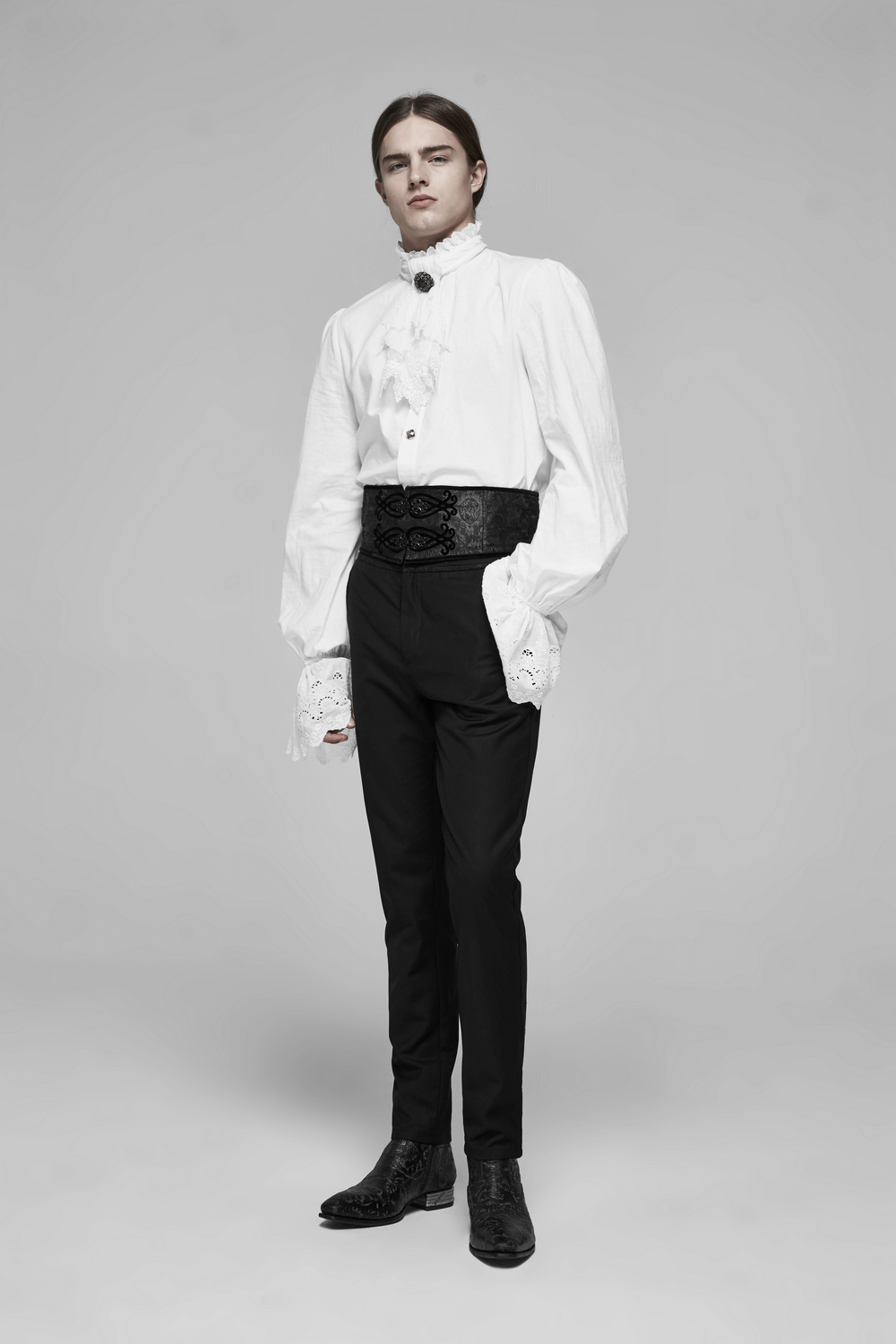 Model wearing a Black Lace-up Jacquard Corset Belt with Metal Buckle, paired with an elegant white shirt and black pants.