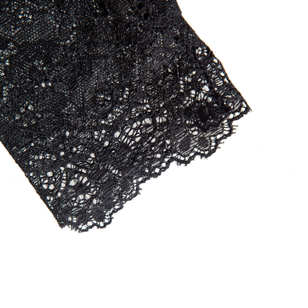 Elegant black lace detail of Victorian-inspired fashion gloves, perfect for adding sophistication to any outfit.