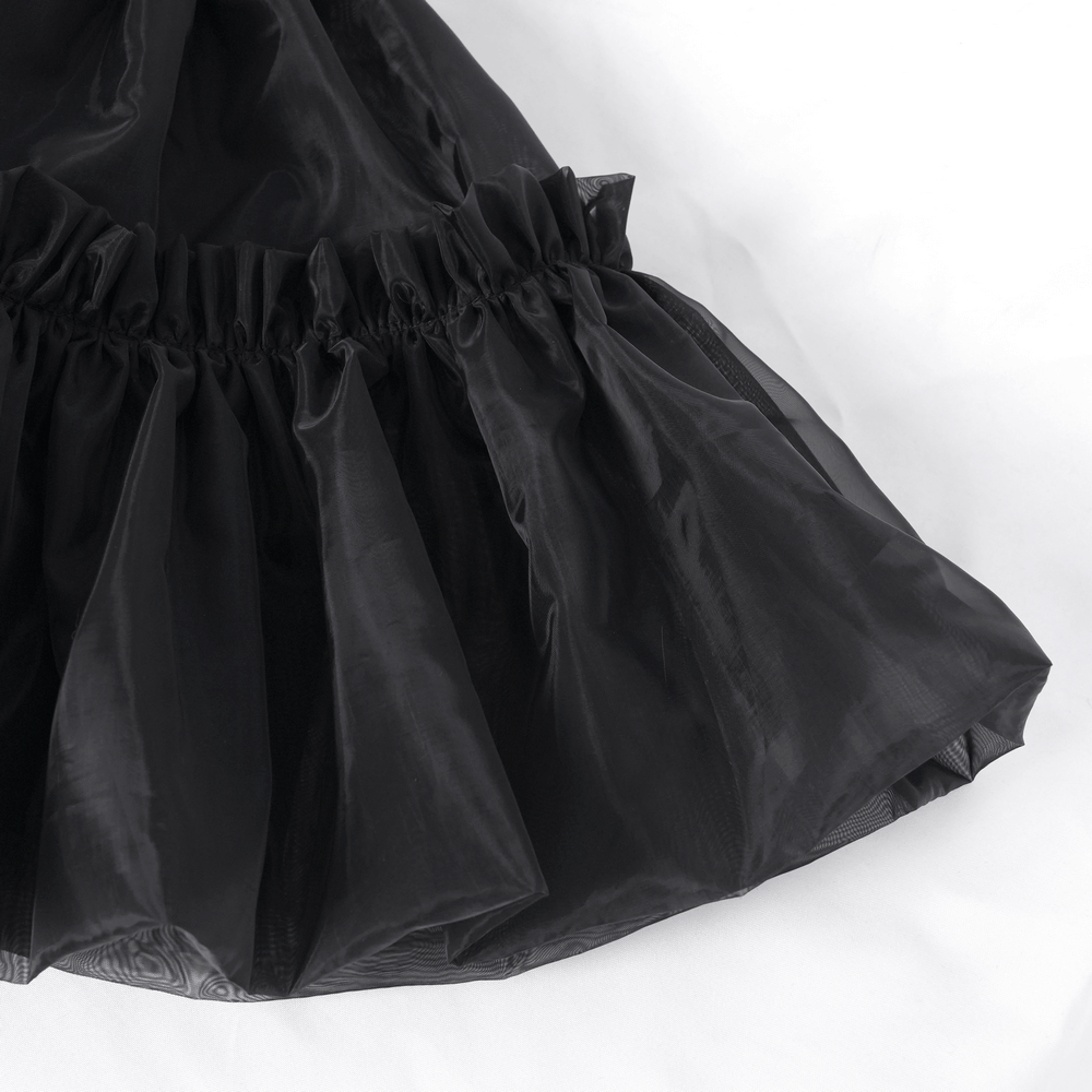 Black layered tulle skirt featuring puffy ruffles and an elastic waist for a vintage Gothic style.
