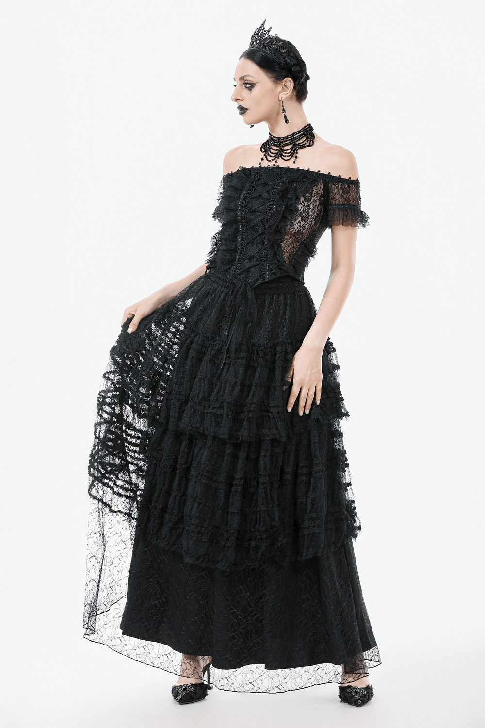 Black layered lace goth maxi skirt with ruffled tiers, showcasing a delicate, enchanting silhouette.