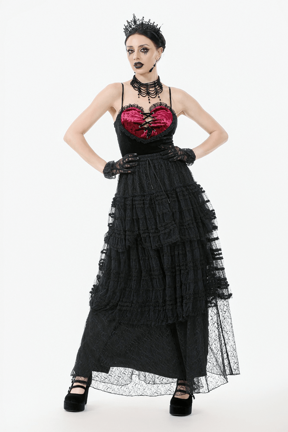 Black layered lace gothic maxi skirt with ruffles, paired with a striking red corset and accessories.