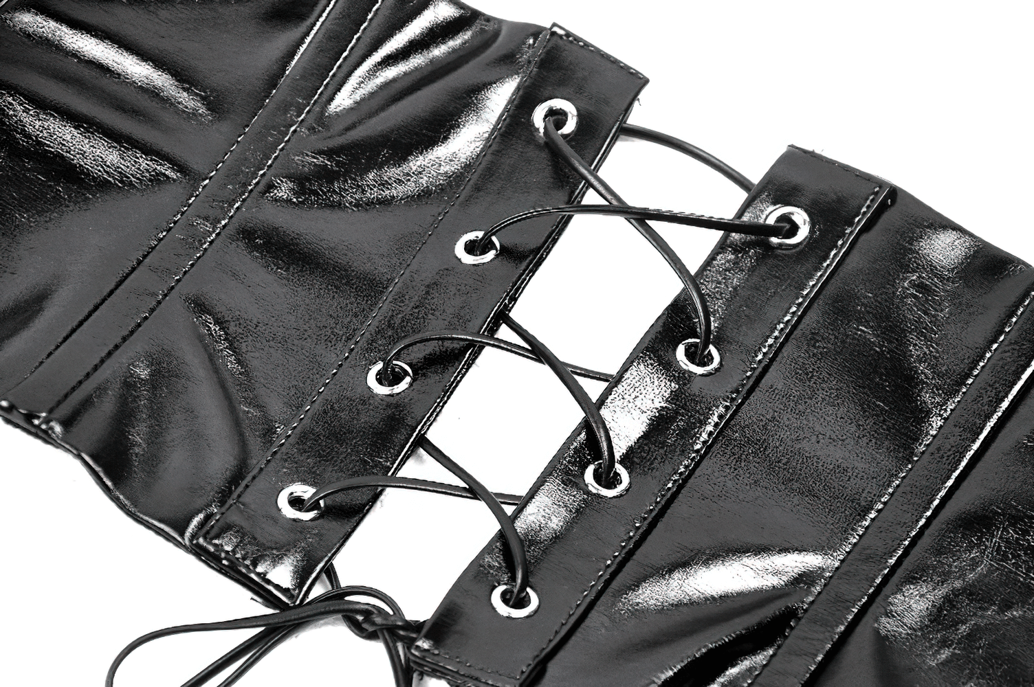 Close-up of a black leather corset belt with lace-up detail and glossy finish, showcasing stylish rivets.