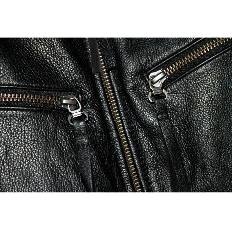 Close-up of zippers on black men's genuine leather motorcycle jacket, showcasing vintage style and durable design.