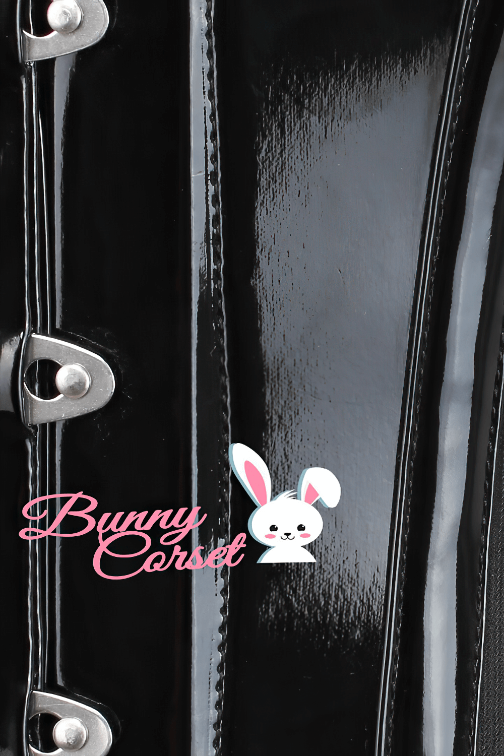 Close-up of a sleek black PVC corset with metal busk, featuring a cute bunny logo and glossy finish.