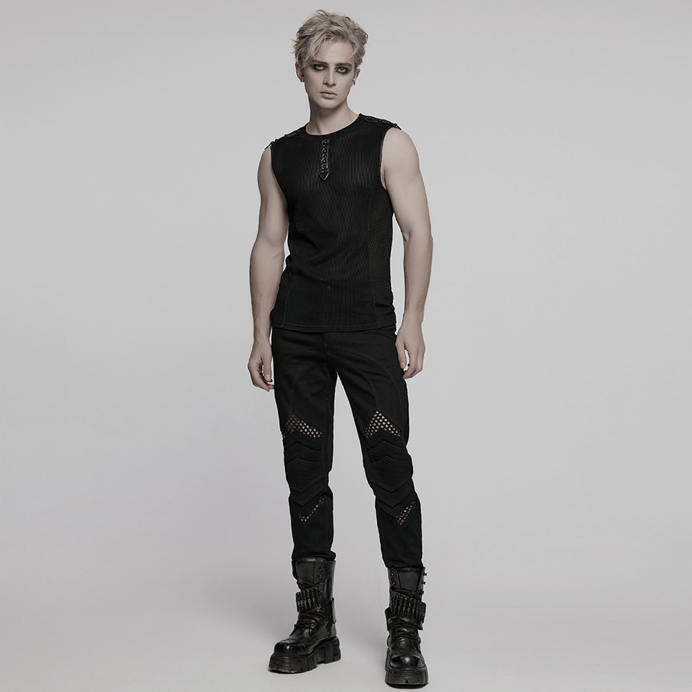 Model wearing a black mesh cyberpunk tank top with buckle detail, paired with dark futuristic pants and stylish boots.