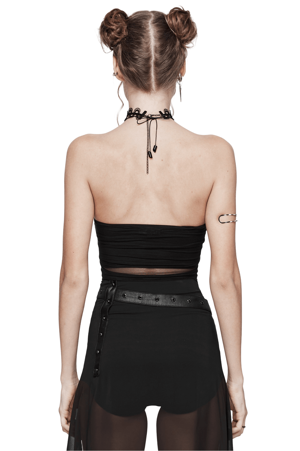 Back view of a black halter top featuring an embroidered gothic skeleton, paired with a sheer black skirt.
