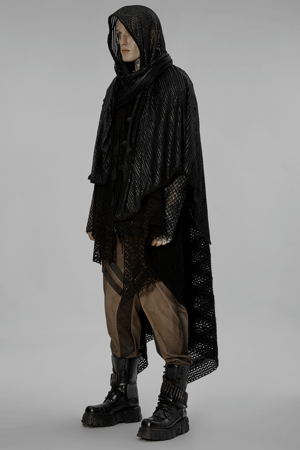 Edgy black mesh hooded scarf on a mannequin, perfect for post-apocalyptic fashion and festival styles.