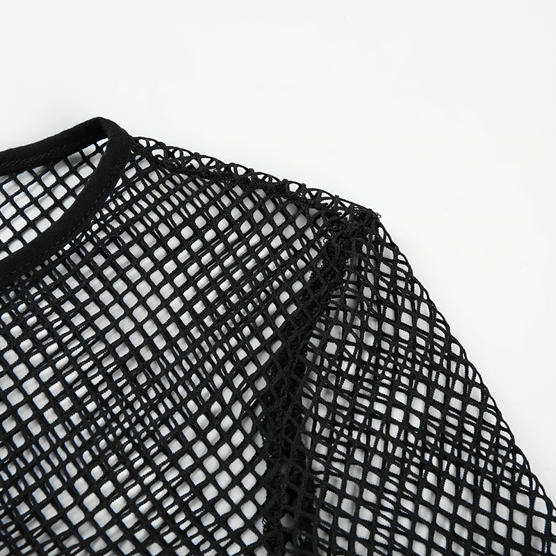 Close-up of a black mesh crop top with long sleeves, showcasing its trendy design and lightweight fabric.