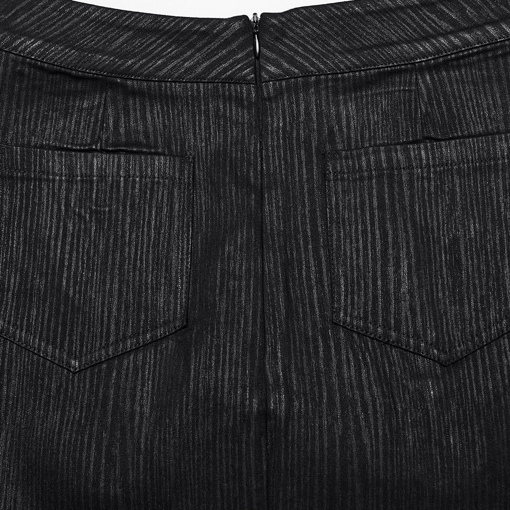 Back view of a black mini skirt with vertical stripes and pockets, showcasing its unique texture and design.