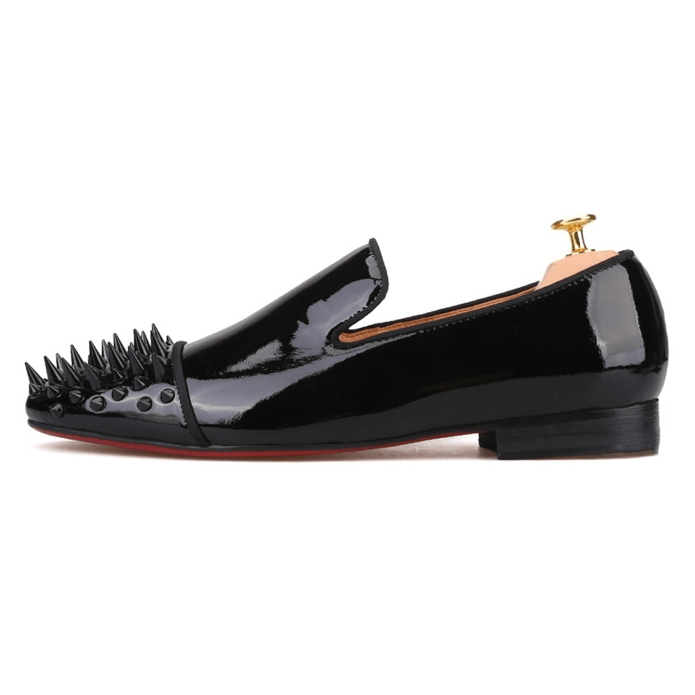 Men's black patent leather loafers with spikes on toe, stylish casual dress shoes for fashionable men.