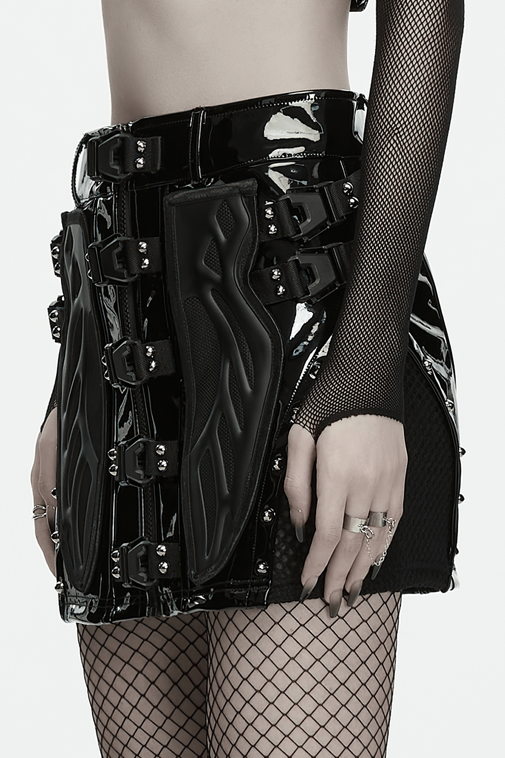 Black Patent Leather Techwear Mini Skirt with Buckles featuring futuristic rubber panels and stylish buckles.