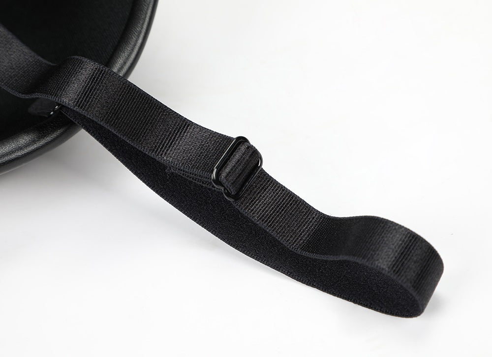 Close-up of adjustable black strap on PU leather crop top, designed for comfort and style.