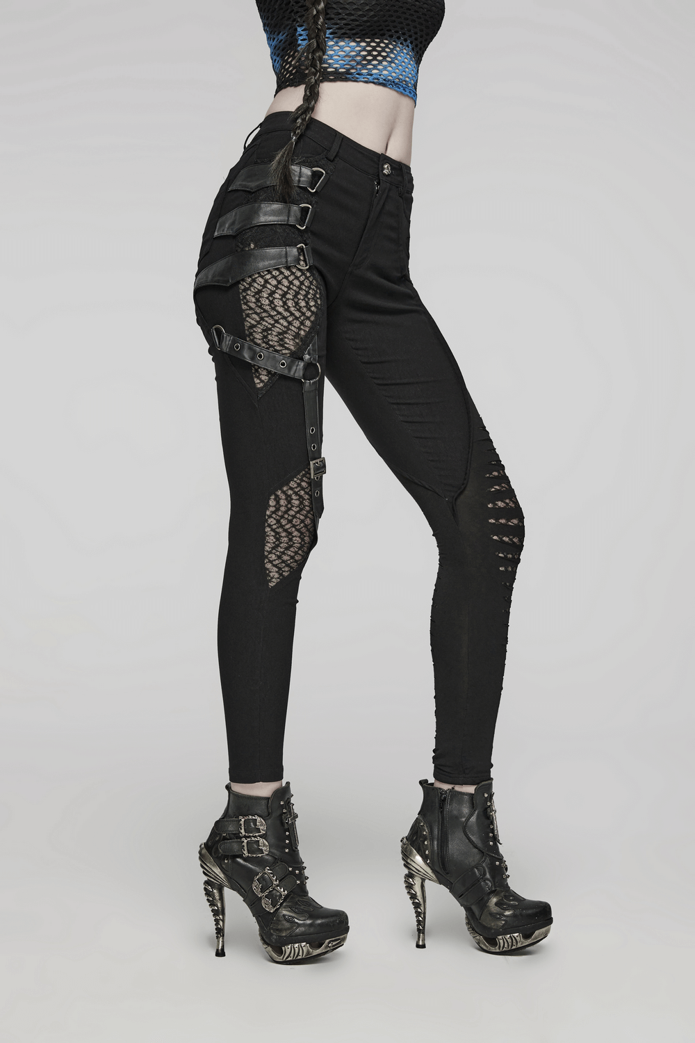 Black punk asymmetric pants with mesh detail, showcasing a bold, edgy design perfect for stand-out style.