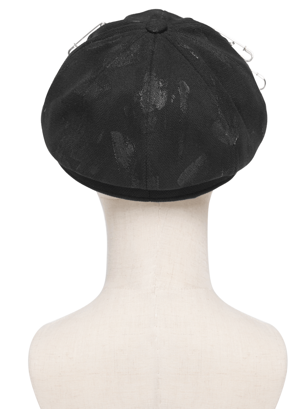 Back view of Black Punk Beret Hat with Spikes Rings and Safety Pin Trim showcasing its unique design.