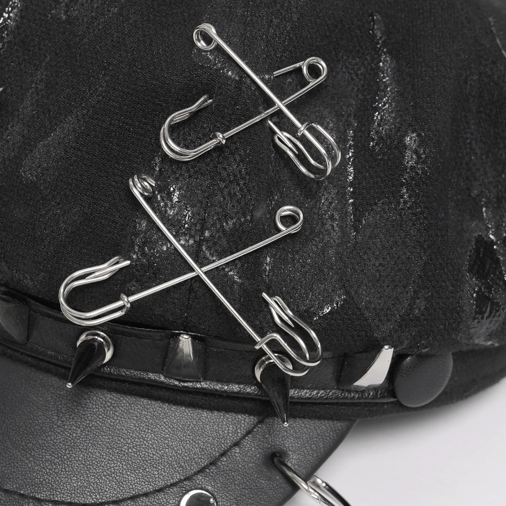 Black Punk Beret Hat with Spikes Rings and Safety Pin Trim showing safety pins and spike details.