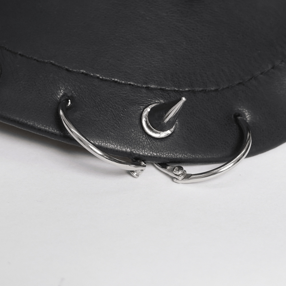 Black Punk Beret Hat with Spikes Rings and Safety Pin Trim close-up details featuring metal rings and spikes.